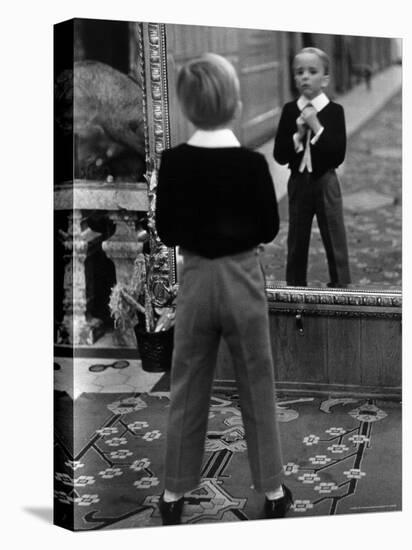 English Boy Using Reflection in Mirror in Foyer of Grand Hotel to Fix His Tie-Alfred Eisenstaedt-Premier Image Canvas