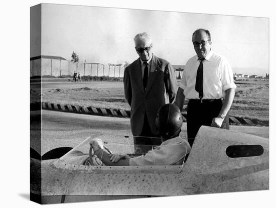 Enzo Ferrari, Carlo Chiti and Martino Severi Testing a New Racing Car-null-Premier Image Canvas