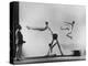 Erik Flensted Jensen, Coach of Danish Gymnastic Team, Watching as Three Men Perform-Gjon Mili-Premier Image Canvas