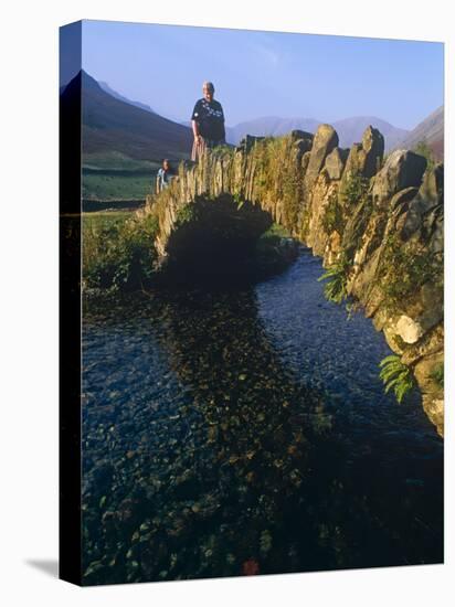 Eskdale, Cumbria, Walkers Crossiing a Tradition Stone Bridge-Paul Harris-Premier Image Canvas