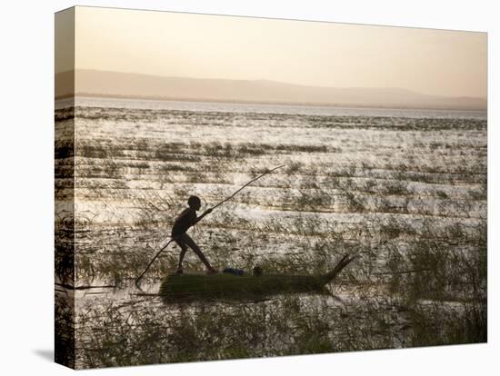 Ethiopia, Lake Awassa; a Young Boy Punts a Traditional Reed Tankwa Through the Reeds-Niels Van Gijn-Premier Image Canvas