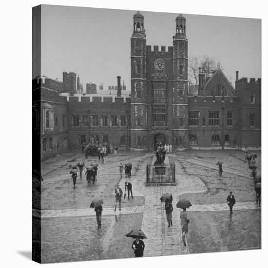 Eton Students in Traditional Tails and Striped Trousers, with Umbrellas, Standing in the Rain-Margaret Bourke-White-Premier Image Canvas