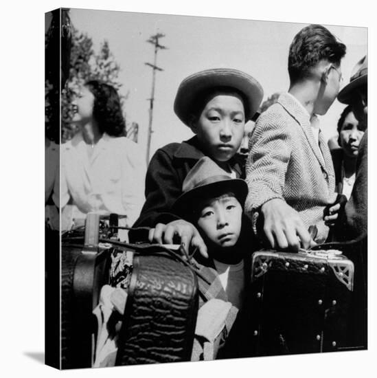 Evacuees of Japan Awaiting Turn for Baggage Inspection upon Arrival at Assembly Center During WWII-Dorothea Lange-Premier Image Canvas