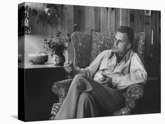 Evangelist, Billy Graham, Sitting in Easy Chair, Talking, in His Home-Ed Clark-Premier Image Canvas