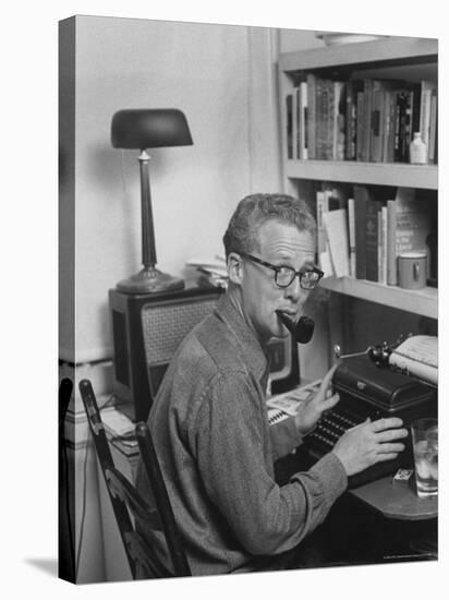 Excellent of Pulitzer Prize Winning Journalist Murray Kempton Smoking Pipe at Typewriter-Martha Holmes-Premier Image Canvas