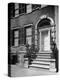 Exterior Facade of the Landmark 19th Century Merchant House with Handsome Wrought-Iron Balustrade-Walter Sanders-Premier Image Canvas