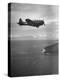 F-6 Hellcat Fighter Plane over Tanahmera Bay as Japanese Airfields at Hollandia, New Guinea-J^ R^ Eyerman-Premier Image Canvas