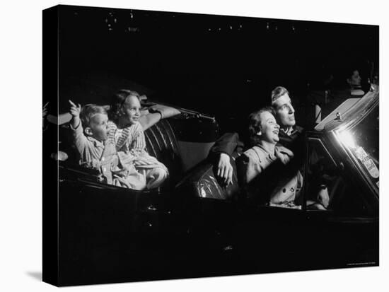 Family Sitting in Convertible Watching Movie at Drive In-Francis Miller-Premier Image Canvas