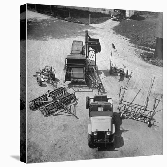 Farm Equipment Surrounding a Farmer's Jeep in Demonstration of Postwar Uses for Military Vehicles-Myron Davis-Premier Image Canvas