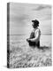 Farmer Posing in His Wheat Field-Ed Clark-Premier Image Canvas