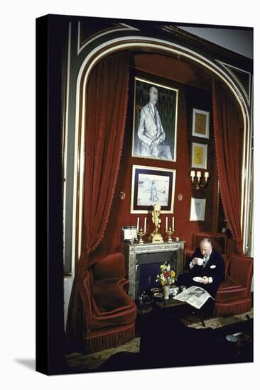 Fashion Designer Christian Dior Having Coffee While Reading Newspaper-Loomis Dean-Premier Image Canvas