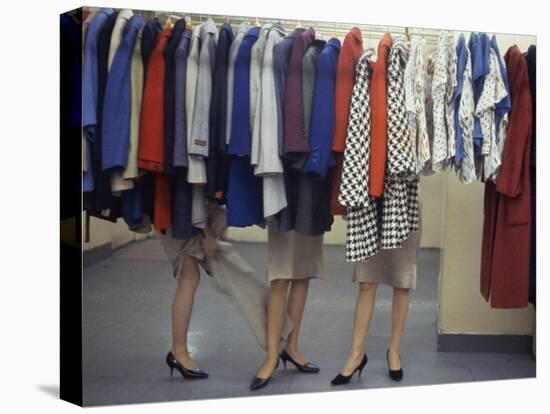 Fashion Models Behind a Suit Rack Trying on Clothes at Zelinka-Matlick, New York, New York, 1960-Walter Sanders-Premier Image Canvas