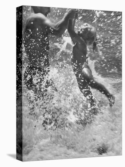 Father and Daughter Playing in the Surf at Jones Beach-Alfred Eisenstaedt-Premier Image Canvas