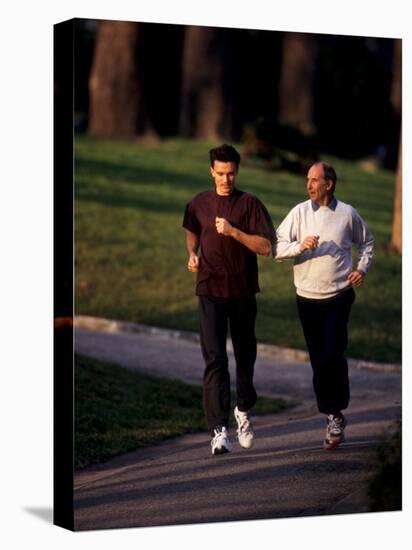 Father and Son Out for a Fitness Run-Paul Sutton-Premier Image Canvas