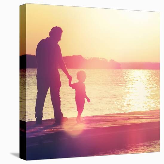 Father and Son Walking Out on a Dock at Sunset-soupstock-Premier Image Canvas