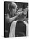 Female Barber Cutting a Customer's Hair in a Barber Shop-Ralph Crane-Premier Image Canvas