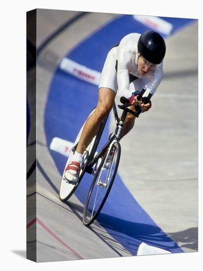 Female Cyclist Racing on the Velodrome Track-null-Premier Image Canvas