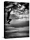 Female Figure Jumping on a Beach-Rory Garforth-Premier Image Canvas