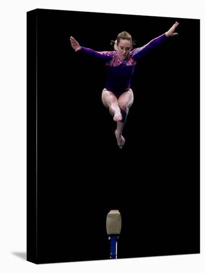 Female Gymnast Performing on the Balance Beam-null-Premier Image Canvas