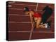 Female Runner at the Start of a Track Race-null-Premier Image Canvas