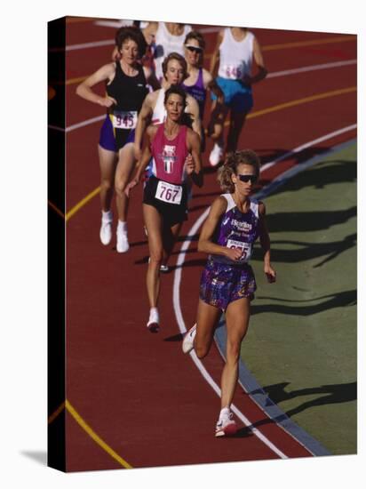 Female Runners Competing in a Track Race-null-Premier Image Canvas