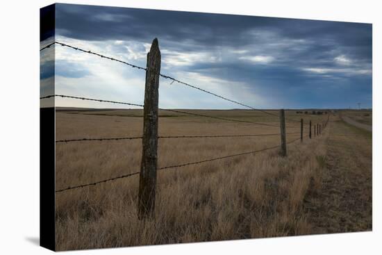 Fence in the Savanah Near the Minuteman Nuclear Missile Site, South Dakota, Usa-Michael Runkel-Premier Image Canvas