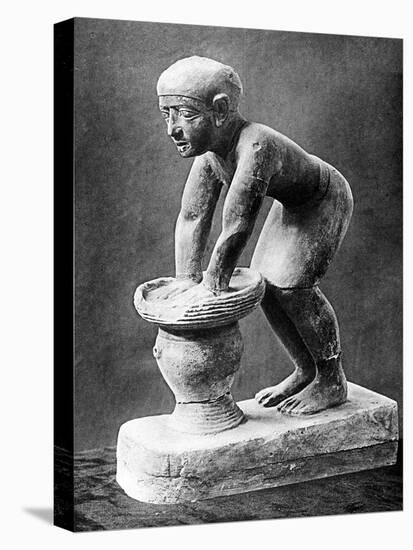 Figure of an Ancient Egyptian Brewer Pressing Out Fermented Bread in a Basket, C1910-null-Premier Image Canvas