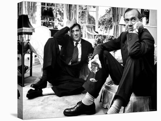 Film Director Carol Reed and Author Graham Greene Sitting on the Floor with Wine Glasses-Larry Burrows-Premier Image Canvas