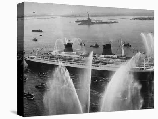 Fireboats Greeting the SS France, as It Enters the New York Harbor on Its Maiden Voyage-Ralph Morse-Premier Image Canvas