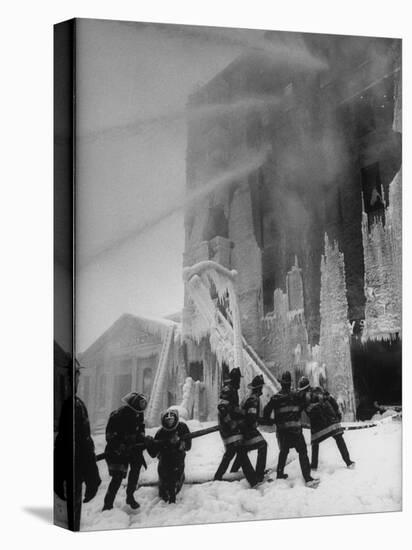 Firemen Fighting a Fire During Icy Weather-Al Fenn-Premier Image Canvas