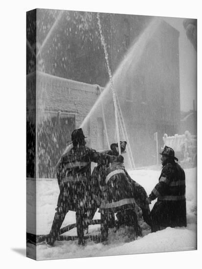 Firemen Fighting a Fire During Icy Weather-Al Fenn-Premier Image Canvas