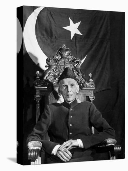 First Gov. Gen. of Independent Pakistan Mohammed Ali Jinnah Sitting in Front of Pakistani Flag-Margaret Bourke-White-Premier Image Canvas