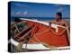 Fisherman Tends His Boat on the Beach, Isla Margarita, Venezuela-Greg Johnston-Premier Image Canvas