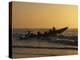 Fishermen Launch their Boat into the Atlantic Ocean at Sunset-Amar Grover-Premier Image Canvas