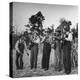 Five Male Musicians Dressed in Hats and Bib Overalls Standing in a Field-Eric Schaal-Premier Image Canvas