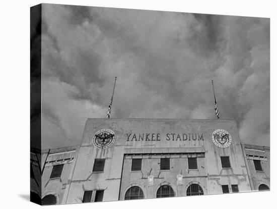 Flags Flying at Half Mast on Top of Yankee Stadium to Honor Late Baseball Player Babe Ruth-Cornell Capa-Premier Image Canvas