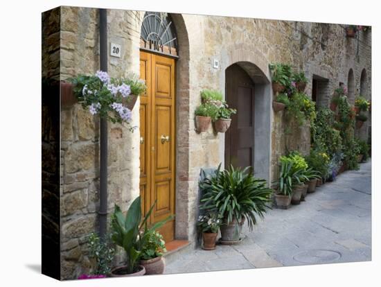 Flower Pots and Potted Plants Decorate a Narrow Street in Tuscan Village, Pienza, Italy-Dennis Flaherty-Premier Image Canvas