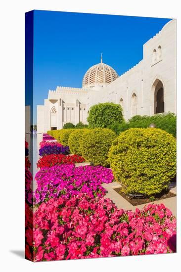 Flowers and dome of Sultan Gaboos Grand Mosque, Muscat, Oman-Jan Miracky-Premier Image Canvas