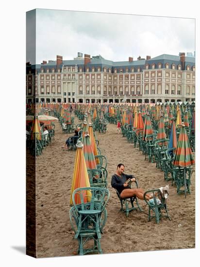 Folded Umbrellas Reflect Nearly Deserted Status of Mar Del Plata Beach-Leonard Mccombe-Premier Image Canvas