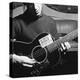 Folk Singer Woody Guthrie Playing Guitar with Sign on It Reading This Machine Kills Fascists-Eric Schaal-Premier Image Canvas