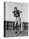 Football Player Throwing Ball-null-Stretched Canvas