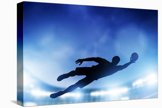 Football, Soccer Match. A Goalkeeper Jumping to Defend, save the Ball from Goal. Lights on the Stad-Michal Bednarek-Premier Image Canvas