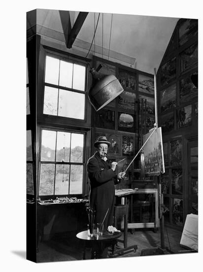 Former PM Winston Churchill Smoking a Cigar in His Studio Dressed in His Blue RAF Siren Jump Suit-Hans Wild-Premier Image Canvas