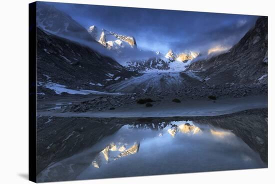 Forno Glacier reflected in a pond at foggy sunrise, Forno Valley, Maloja Pass, Switzerland-Francesco Bergamaschi-Stretched Canvas