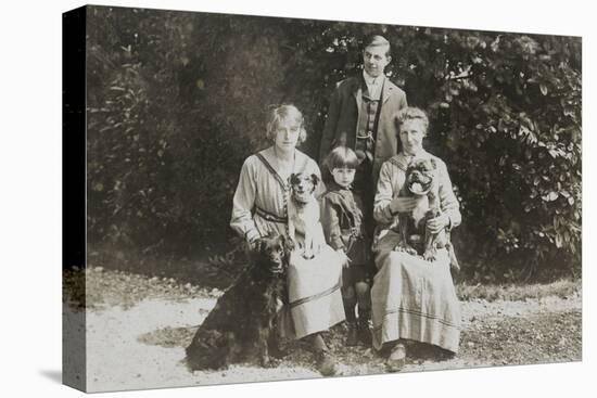 Four People and Three Dogs in a Garden-null-Premier Image Canvas