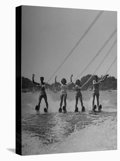 Four People Competing in the National Water Skiing Championship Tournament-Mark Kauffman-Premier Image Canvas