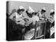 Four Young British Student Nurses Making Notes Together from Medical Textbooks-null-Premier Image Canvas