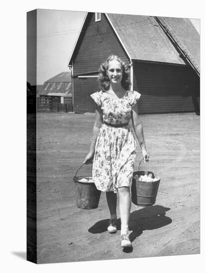 Francis Larson Collecting Eggs on Her Farm-Bob Landry-Premier Image Canvas