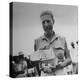 Freed American Pow Holding Red Cross Supplies after His Release from a Japanese Prison Camp-Carl Mydans-Premier Image Canvas