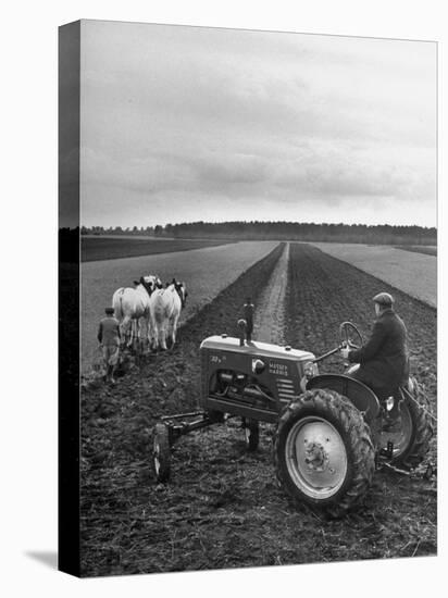 French Farmer Georges Raoul Fremond Trying Out His New Massey-Harris Tractor Obtained Through Eca-null-Premier Image Canvas